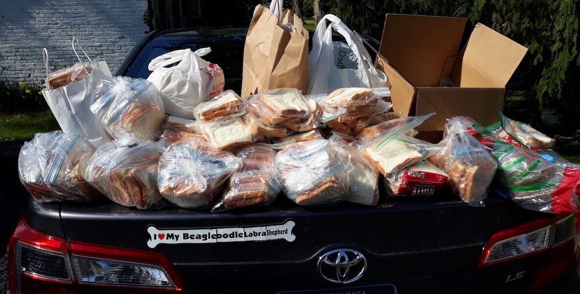 A trunk full of peanut butter and jelly sandwiches that will be distributed to people experiencing hunger in Philadelphia during Covid-19.
