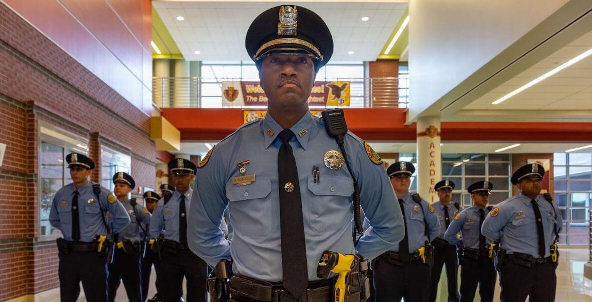 Police officers stand at the ready in New Orleans, where they underwent ethical police training.