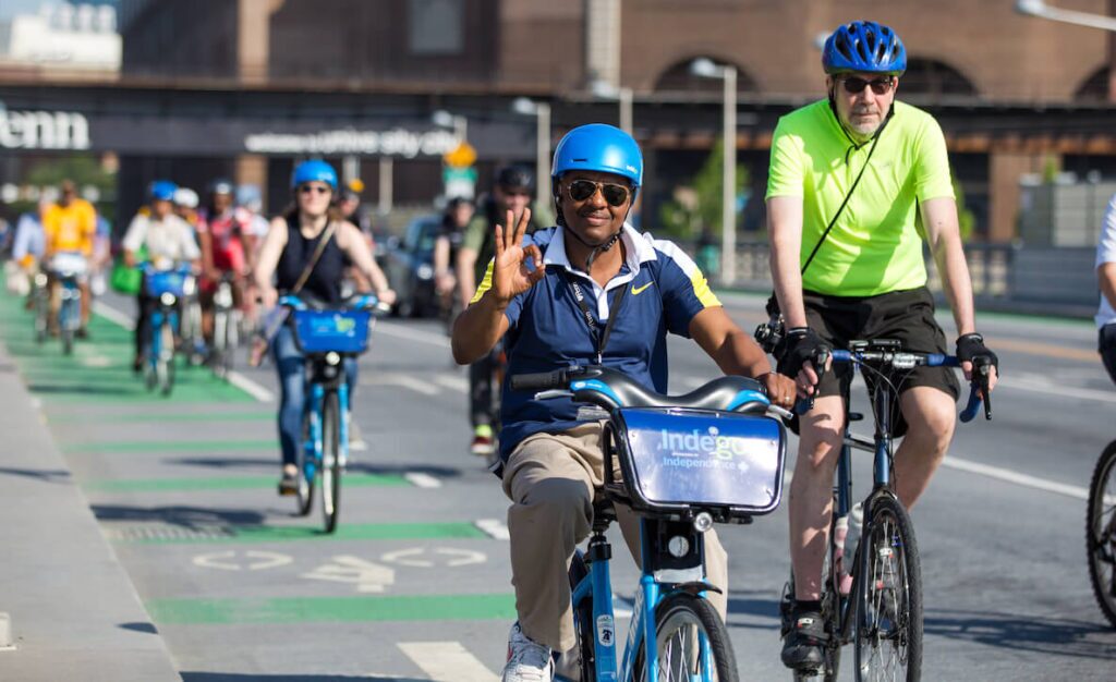 A man rides an Indego bike in Philadelphia