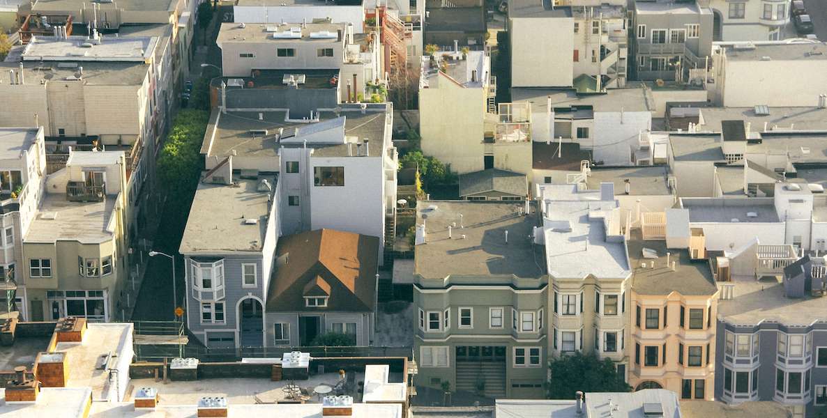 An aerial view of mixed housing in an urban area