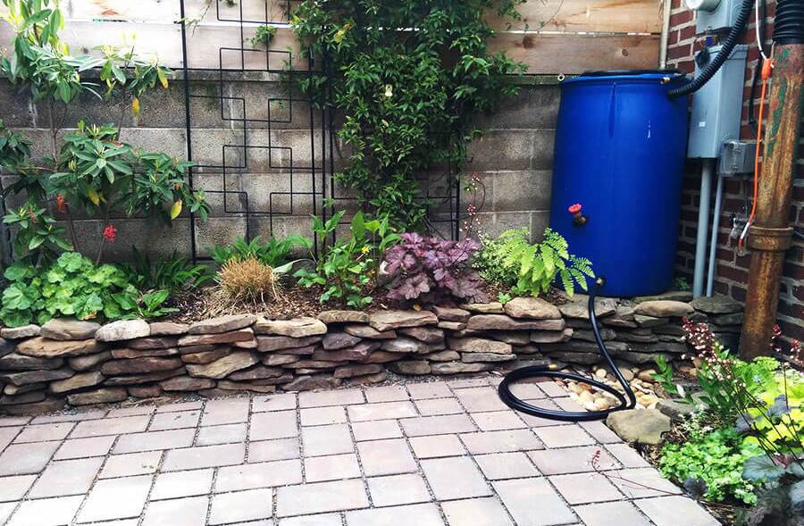 Photo shows a rain barrel that was installed for free by the Philadelphia Water Department