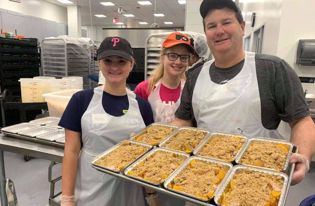 MANNA volunteers prepare meals that will be delivered to Philadelphians struggling with illness.