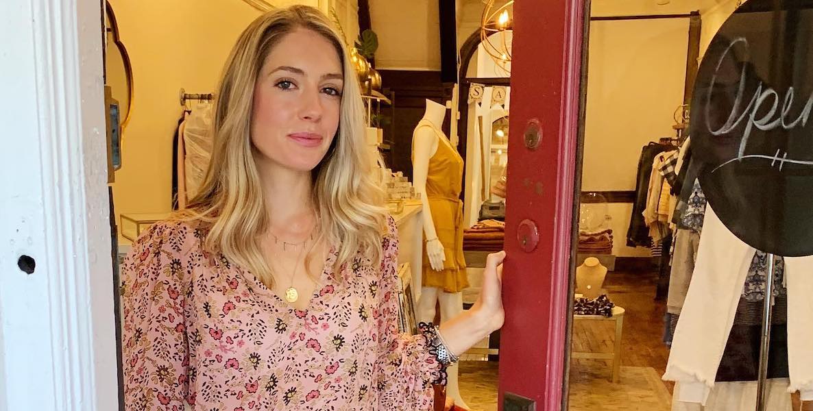 Threads on Main owner Anna Purcell stands in front of her store on Main Street