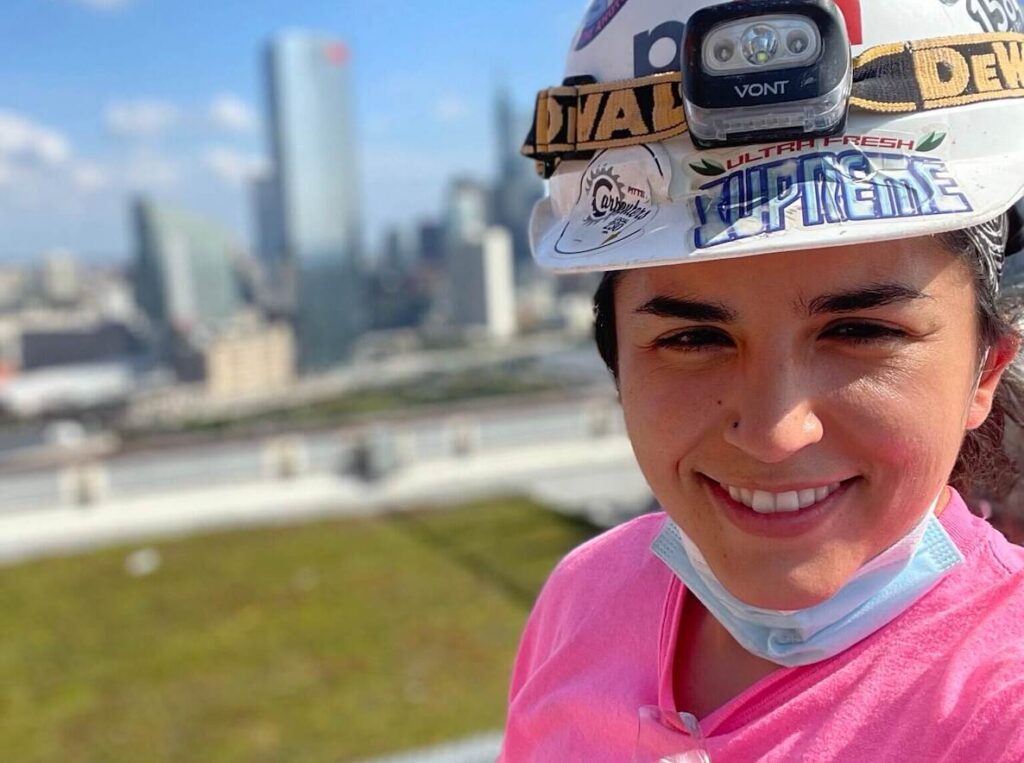 This photo of Philly carpenter Gina Yiantselis illustrates an article about a carpentry program in Philadelphia that's training women to be carpenters