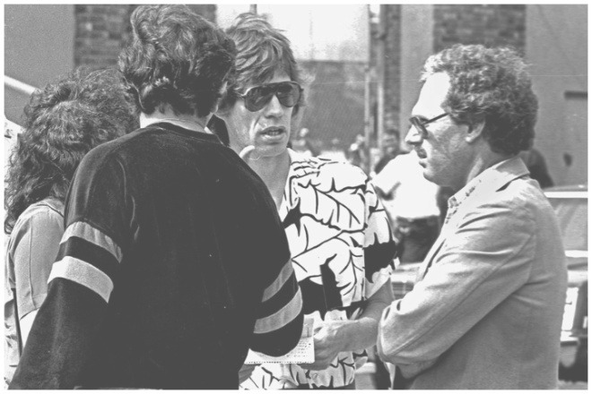 Left to right: Bill Campbell, Mick Jagger and Larry Magid.