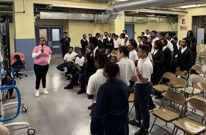 "Twin Sister Docs" Elena McDonald and Delana Wardlaw at a school health and wellness session.