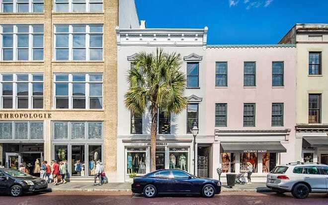 Shops and parked cars along King Street in Charleston, South Carolina.