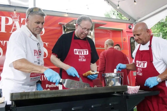 David Cohen cooking cheesesteaks with Pat’s cooks on July 4th in Ottawa (on actual Philly rolls, of course).