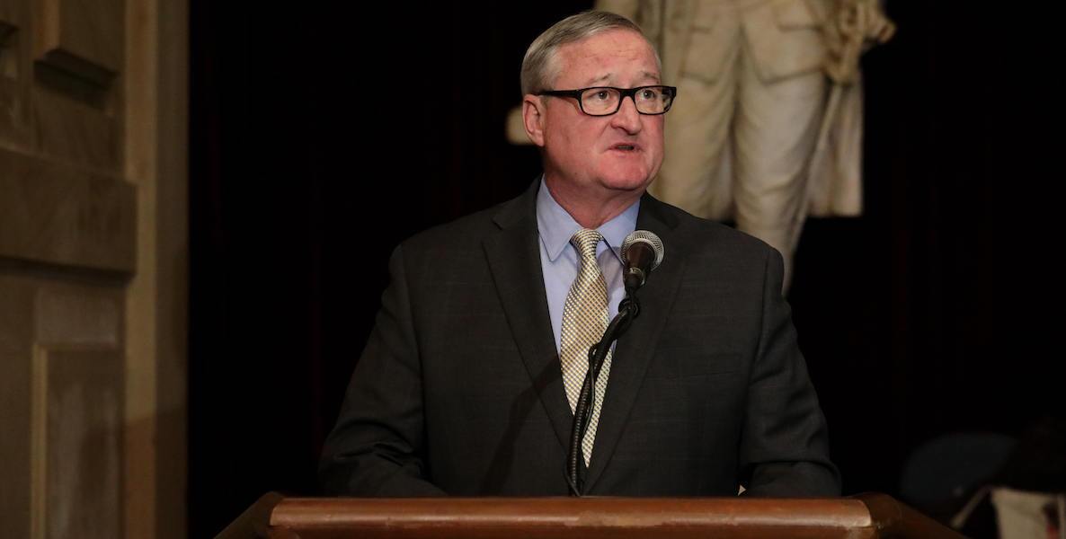 Mayor Jim Kenney speaks from a podium.