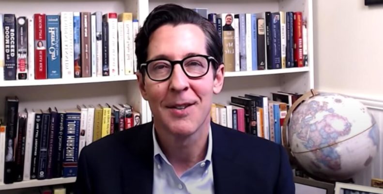 Treasurer Joe Torsella on a virtual conference from his home library