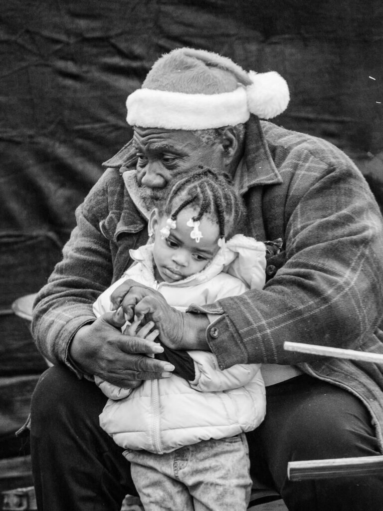 This photo accompanies an article about Andrea Walls' "Celebration of Life" photo series, showing at the Museum of Black Joy
