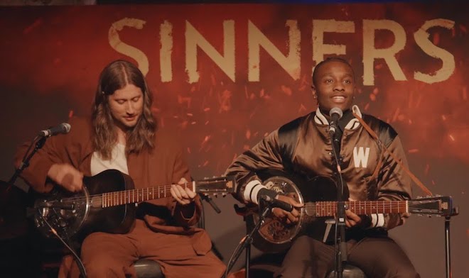 Miles Caton (right) plays "I Lied to You," from <i>Sinners</i> with Swedish guitarist Ludwig Goransson.