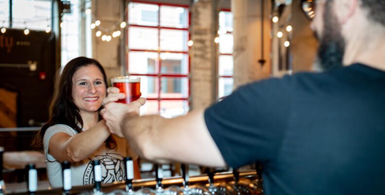 This photo accompanies a guide to the best Philadelphia breweries that have delicious beer and also give back to the community