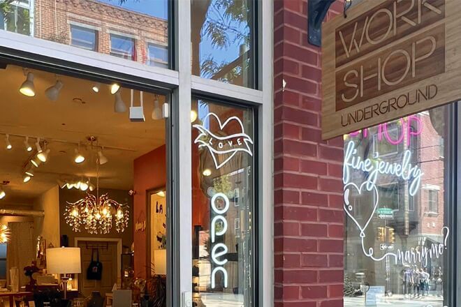 An exterior of the brick and glass facade of the Philadelphia jewelry, gift and housewares shop, Workshop Underground