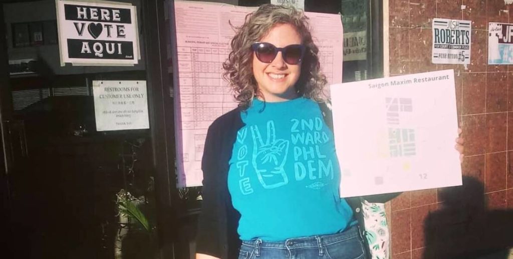 A poll worker wearing shades in Philadelphia gets ready to help voters on Election Day