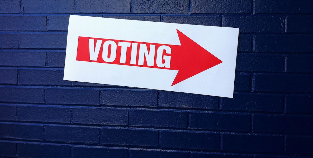 A sign points voters to early voting satellite stations, which make it easer to vote early in the state of Pennsylvania