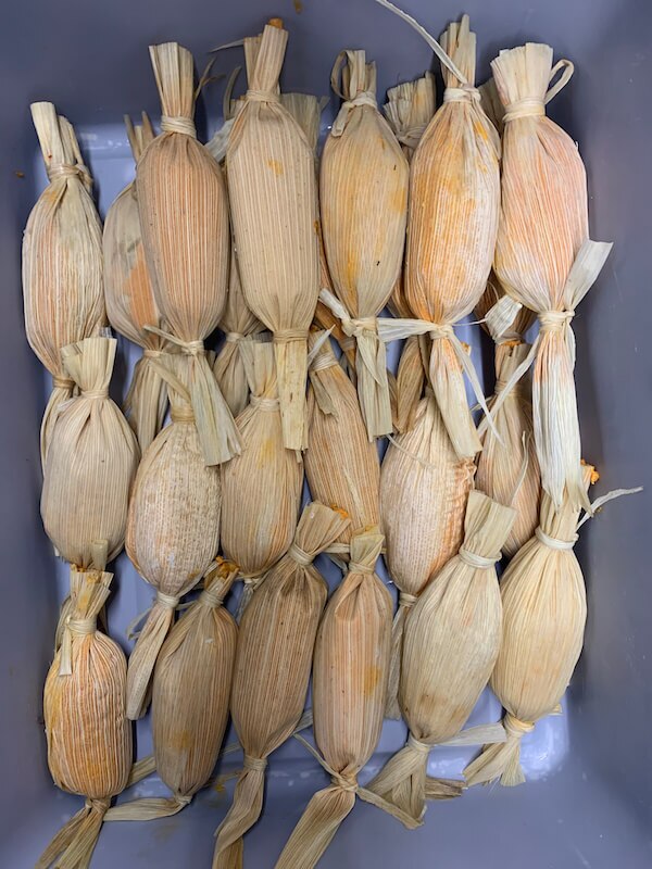A bin full of steamy, warm and delicious tamales, courtesy of Proyecto Tamal in Philadelphia