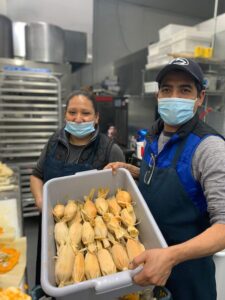 Proyecto Tamal chefs show off some tamales that they're selling to Philadelphians during the Covid-19 pandemic.