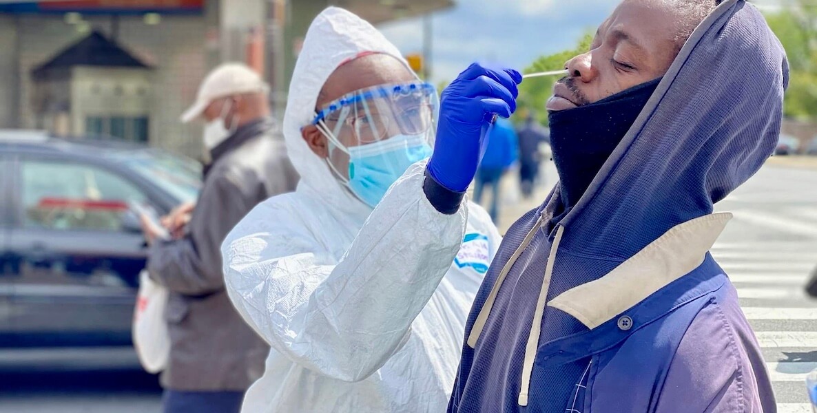 Dr. Ala Stanford administers a coronavirus test on a black man in Philadelphia