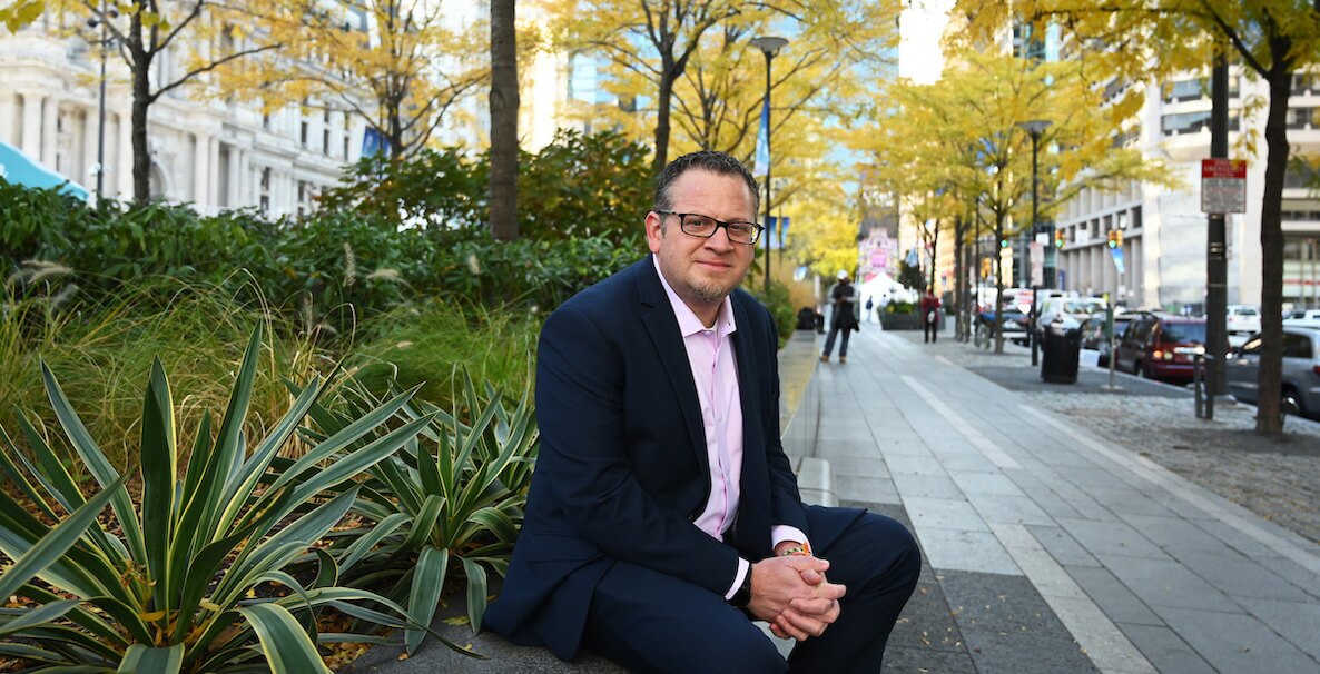 De-Carceration Fund founder Chris Bentley sitting in Center City