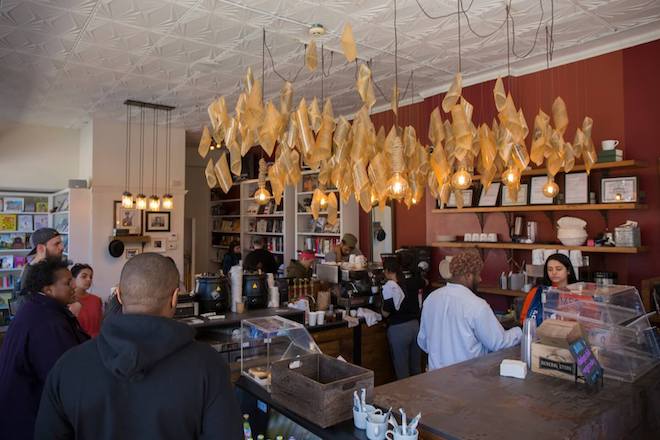 This photo of Uncle Bobbie's illustrates a guide to black-owned shops, cafés, pizza and water ice joints, beauty boutiques, bookstores, and even an auto mechanic whose Black owners are committed to making our city better