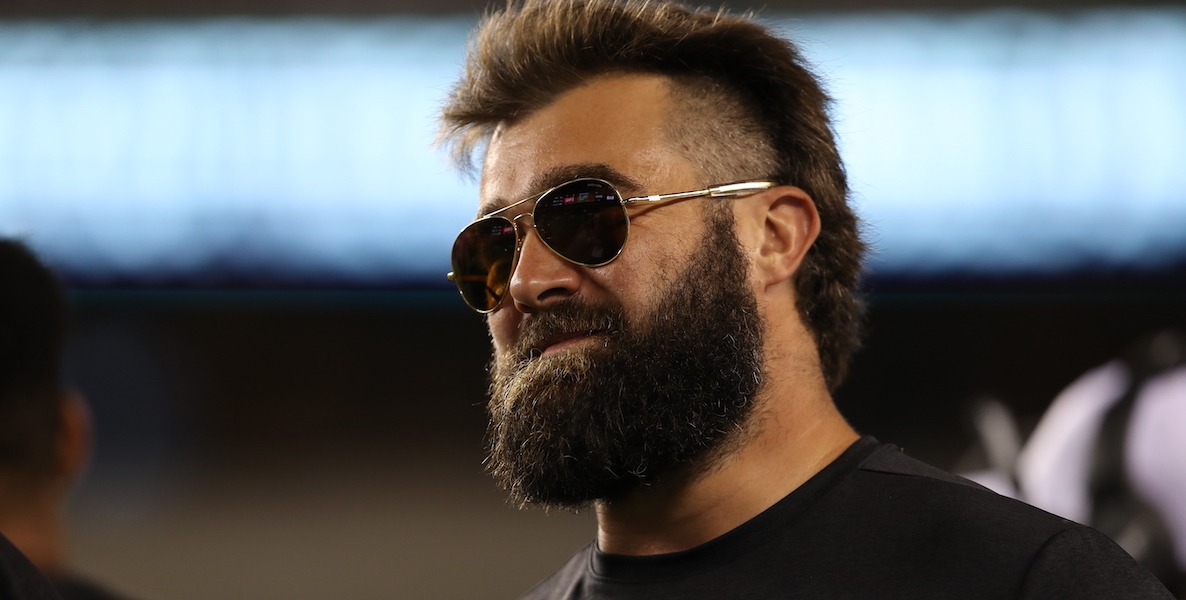 Philadelphia Eagles offensive lineman Jason Kelce wears a pair of sunglasses, looking too cool school for school.
