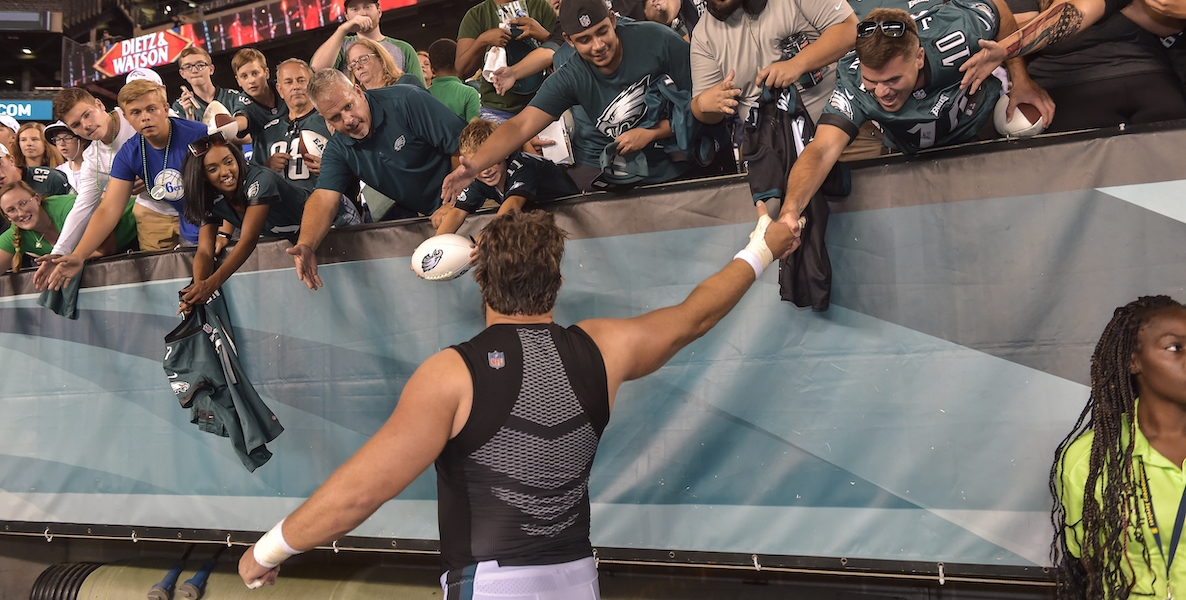 Jason Kelce high-fives fans at Lincoln Financial Field in Philadelphia