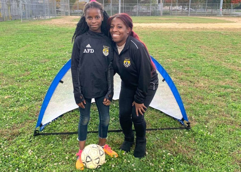 Kensington Soccer Club coach Brianna Banks with player Malena Morrison