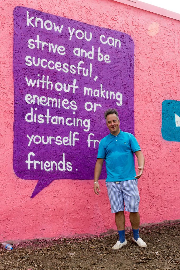 Steve Powers with one of his murals for Ralph Brooks Park. Photo: Laura Storck