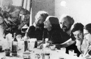 Connie Smukler (third from left) in a Soviet flat. Natan Sharansky by the window; Smukler is flanked by two other Refuseniks; and Ida Nudel, a famous female Refusenik, is on the end. Courtesy of Connie Smukler.