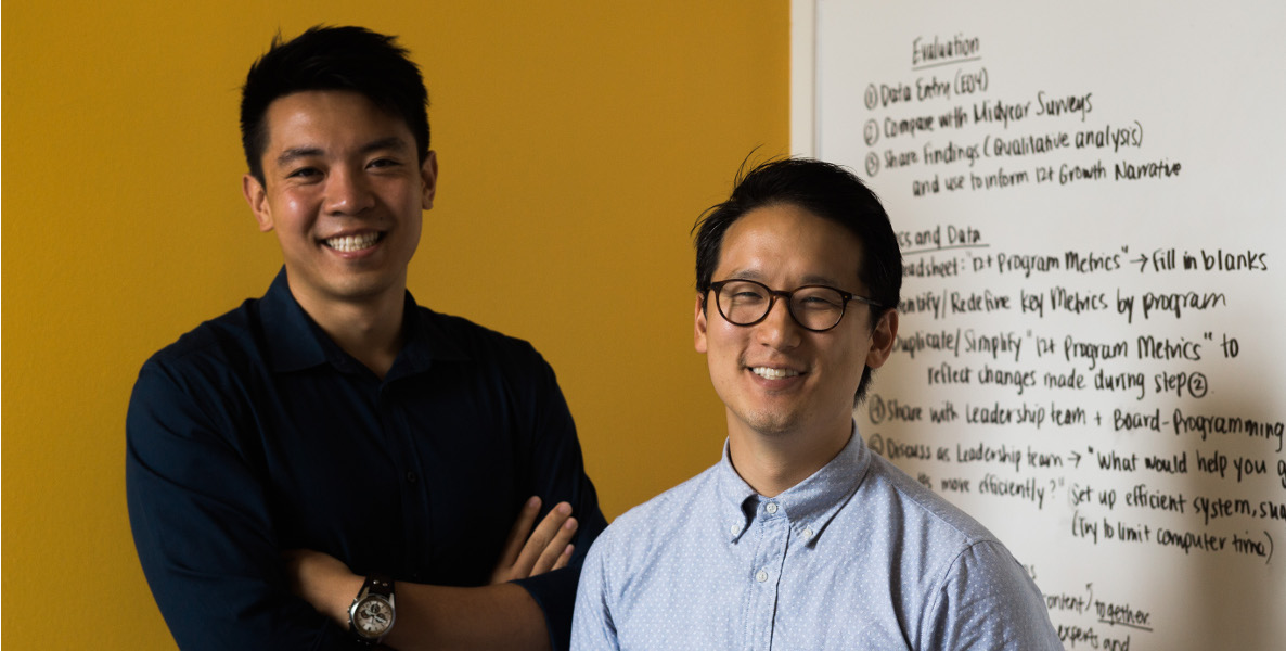 The two people are Raymond John and Frank Wang. Raymond is the CEO and Frank is a Staff Teacher. Raymond is on the left and Frank the right.