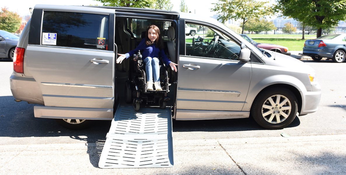 Shannon DeVido shows off her van. She hopes to use it to transport local people to the polls on Election Day.