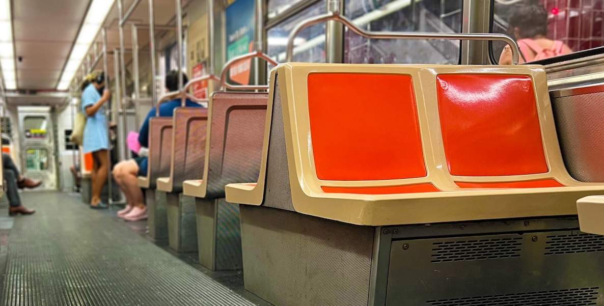 Hard orange seats are the hallmark of SEPTA's Broad Street Line, whose stations do not all offer wheelchair access.