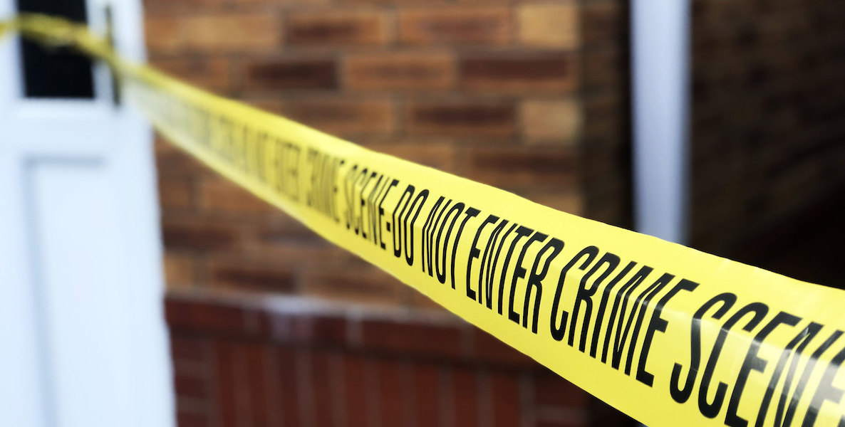 Police tape marks a crime scene