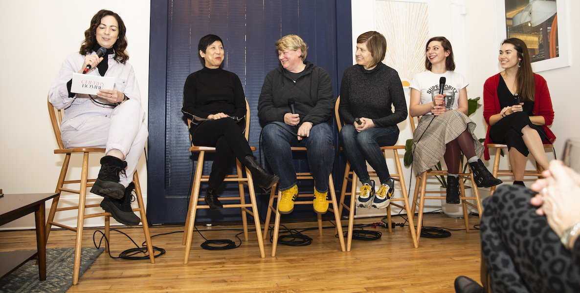 Female chefs sit on stools at a Cherry Bombe event panel spotlighting Philly's female-driven food scene.