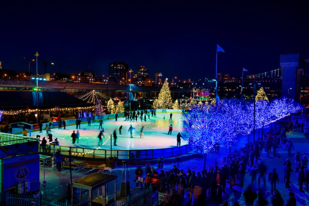 People skate on the ice at Blue Cross RiverRink Winterfest. 