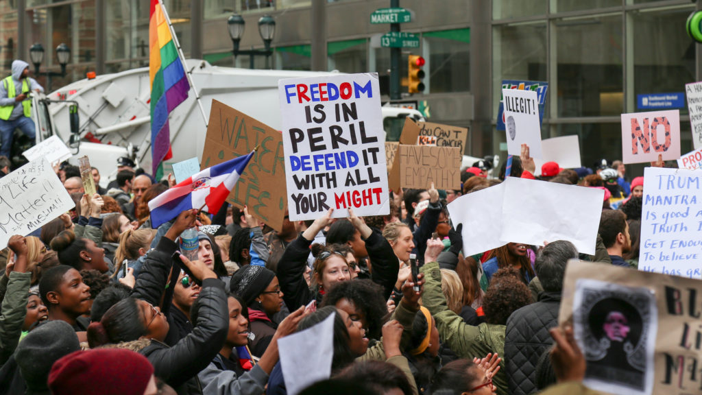 A crowd of protestors gather in Center City Philadelphia
