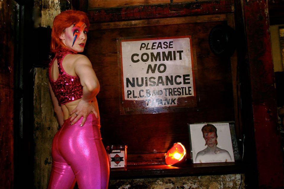 A go-go dancer dressed as David Bowie dances at The Trestle Inn during Philly Loves Bowie Week