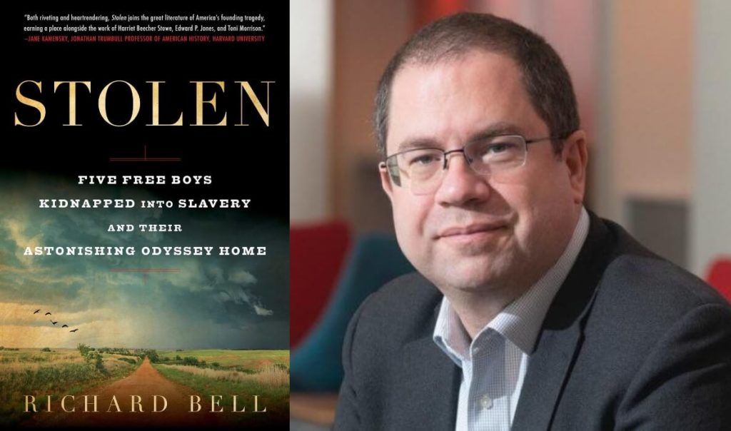Dr. Richard Bell next to his new book, "Stolen: Five Free Boys Kidnapped into Slavery and Their Astonishing Odyssey Home"