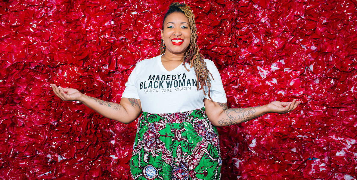 Black Girl Ventures founder Shelly Bell with a T-shirt on that reads "Made by a black woman."