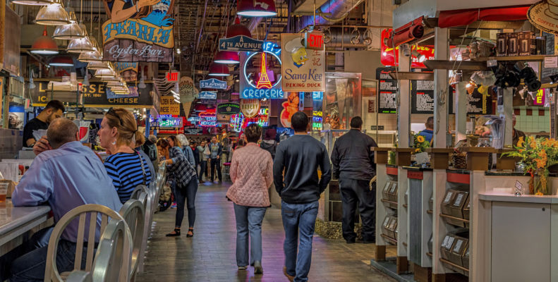 Shoppers stroll through the aisles at Reading Terminal Market.