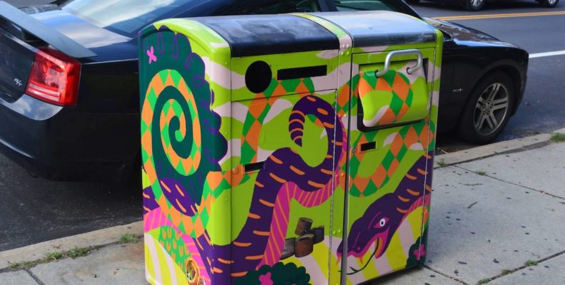Two Big Belly garbage cans in Philadelphia are decorated with designs by a local artist.