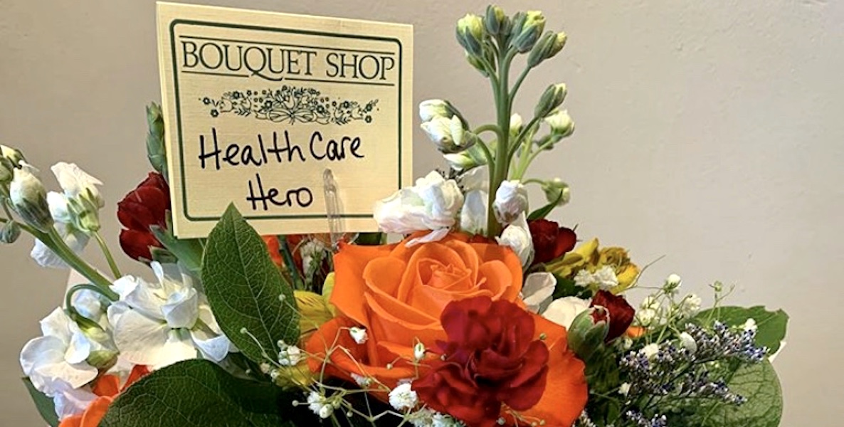 An arrangement of flowers from The Bouquet Shop in Bryn Mawr addressed to a health care hero during the coronavirus pandemic.