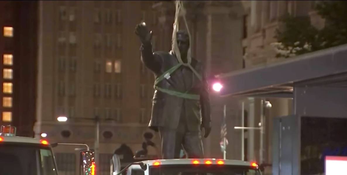The controversial Frank Rizzo statue is hoisted into a truck and hauled away following a week of intense race riots in Philadelphia.