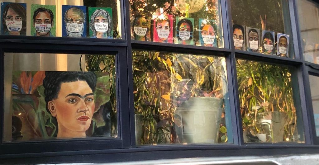 Pandemic window art Frida Kahlo people with masks