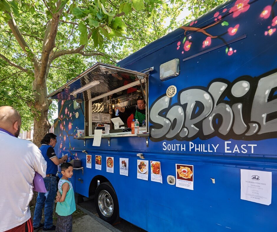 Customers line up for grub at SEAMAAC's SoPhiE (or South Philly East) Food Truck