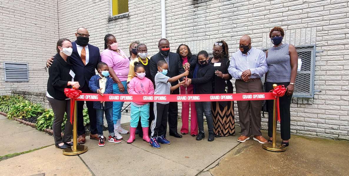 Parents, students and teachers cut a ribbon at the grand opening celebration of Philadelphia Community Stakeholders’ new—free—pod for public school students.