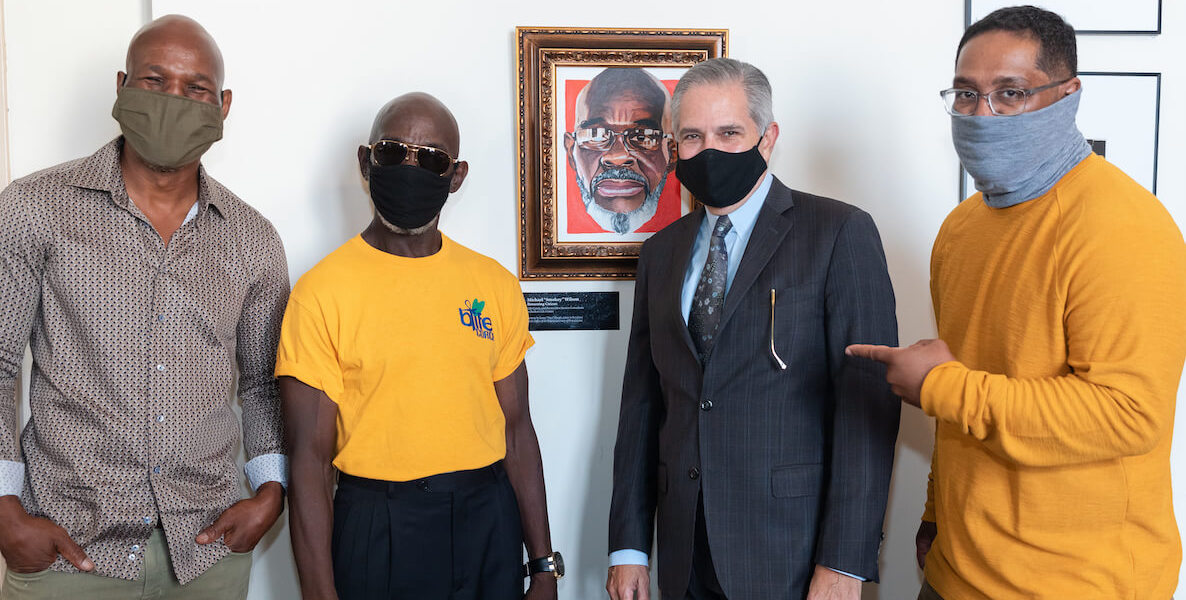 Philadelphia District Attorney poses with artists involved in the Point of Connection art exhibition