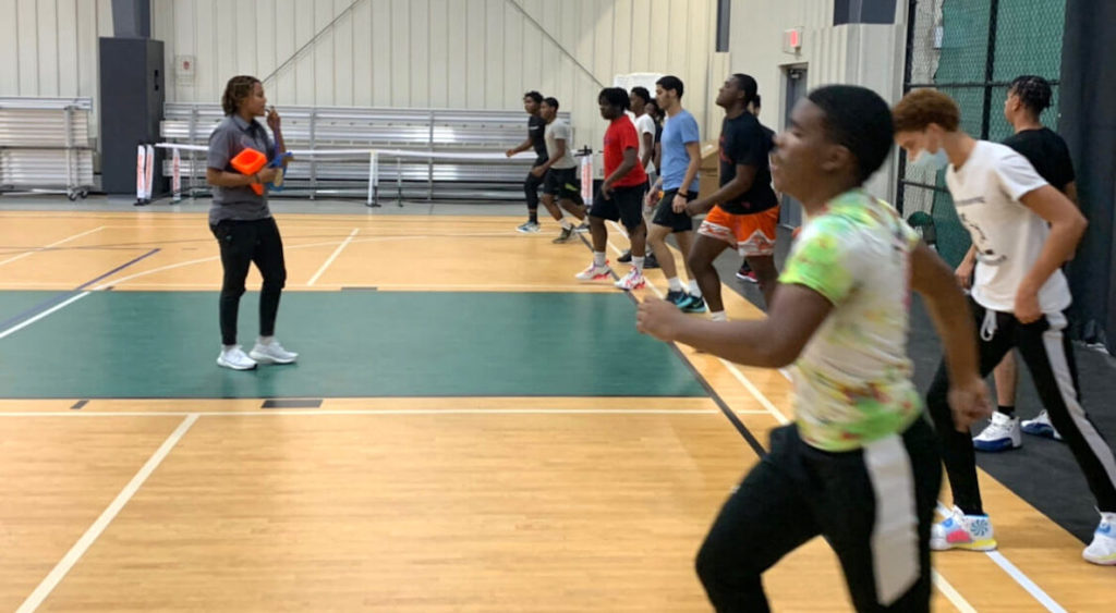 Youth run laps in the I Am Because We Are Basketball program in Philadelphia