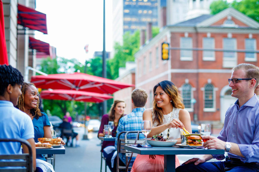 Diners eat outdoors at Red Owl Tavern in Old City Philadelphia
